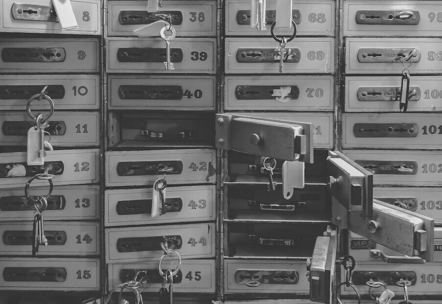grayscale photography of door lockers