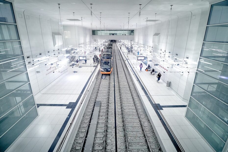 a train station with a train on the tracks